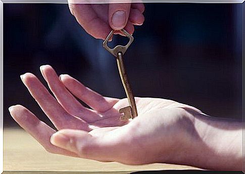 Hand with a key