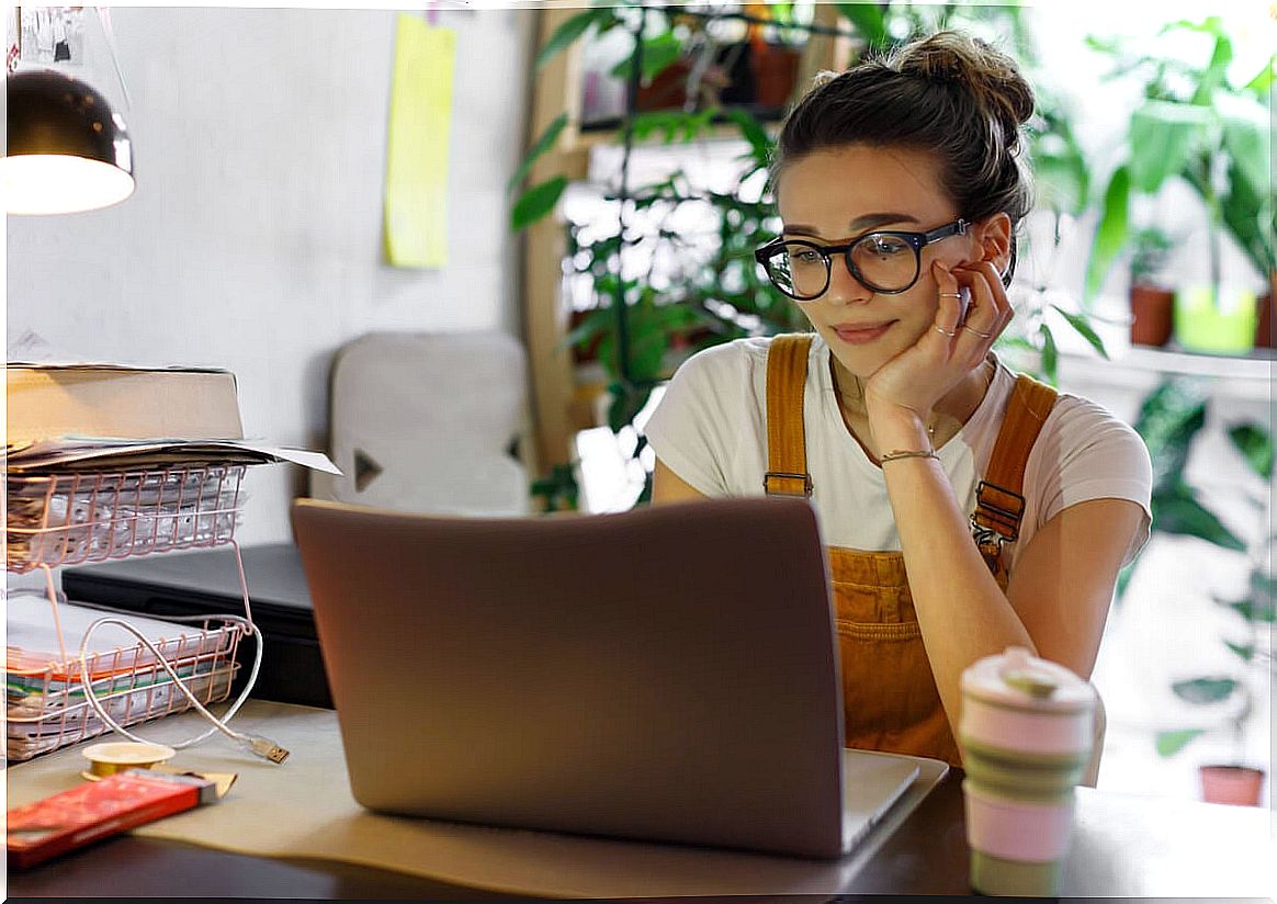 Girl searching for information on the computer