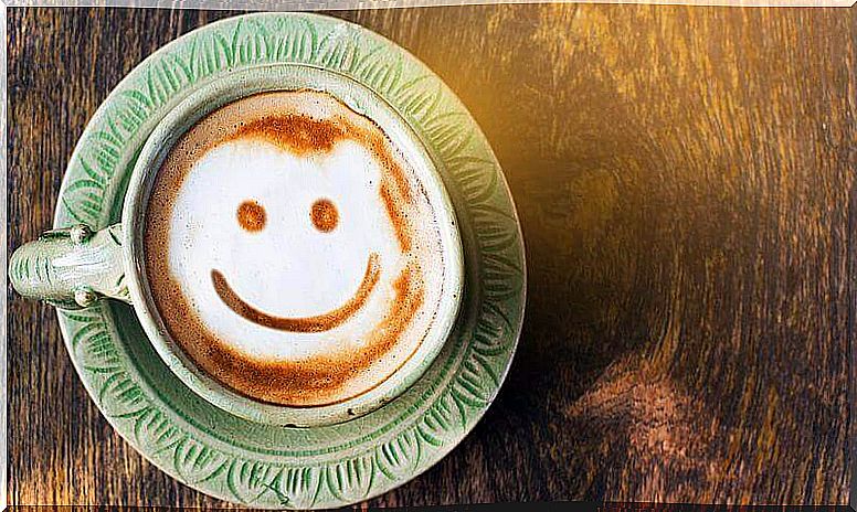 Humor represented by a smile in a cup of coffee